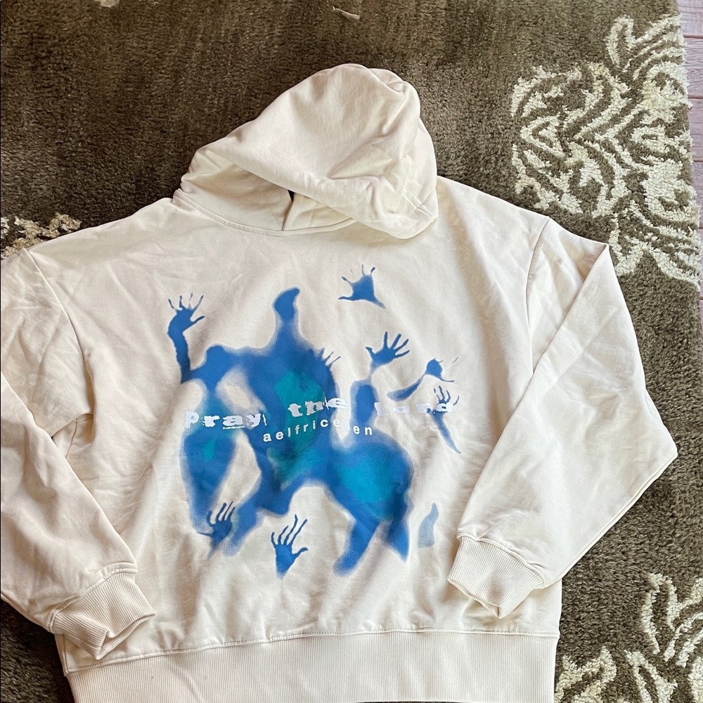 Cream Hoodie with Blue Graphic